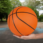 Close-up of the durable pimpled rubber texture of the mini basketball.