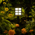 The top view of a solar garden light highlighting its integrated solar panel for efficient charging.