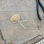 Detailed view of the soft yet effective cotton polishing wheel material.