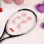 Close-up of lightweight tennis racket nylon strings and aluminium frame