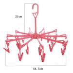 Drying rack with blue clips for underwear and bras, designed for optimal airflow.