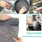 Microfiber dish cloth being rinsed under running water for easy cleaning.