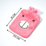 Person holding the Pink Hot Water Bag on their lower back for targeted pain relief.