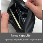Close-up of the phone holder section of the running armband, highlighting the secure pocket and reflective accents.