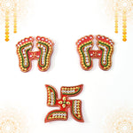 Assorted Laxmi Charan and Swastik decals in bright hues for Diwali décor