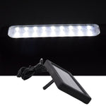 Eco shine mode lit on outdoor hanging solar LED light in garden setting