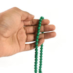 Detailed view of the tasbih beads and small bag, perfect for spiritual reflection during Umrah.