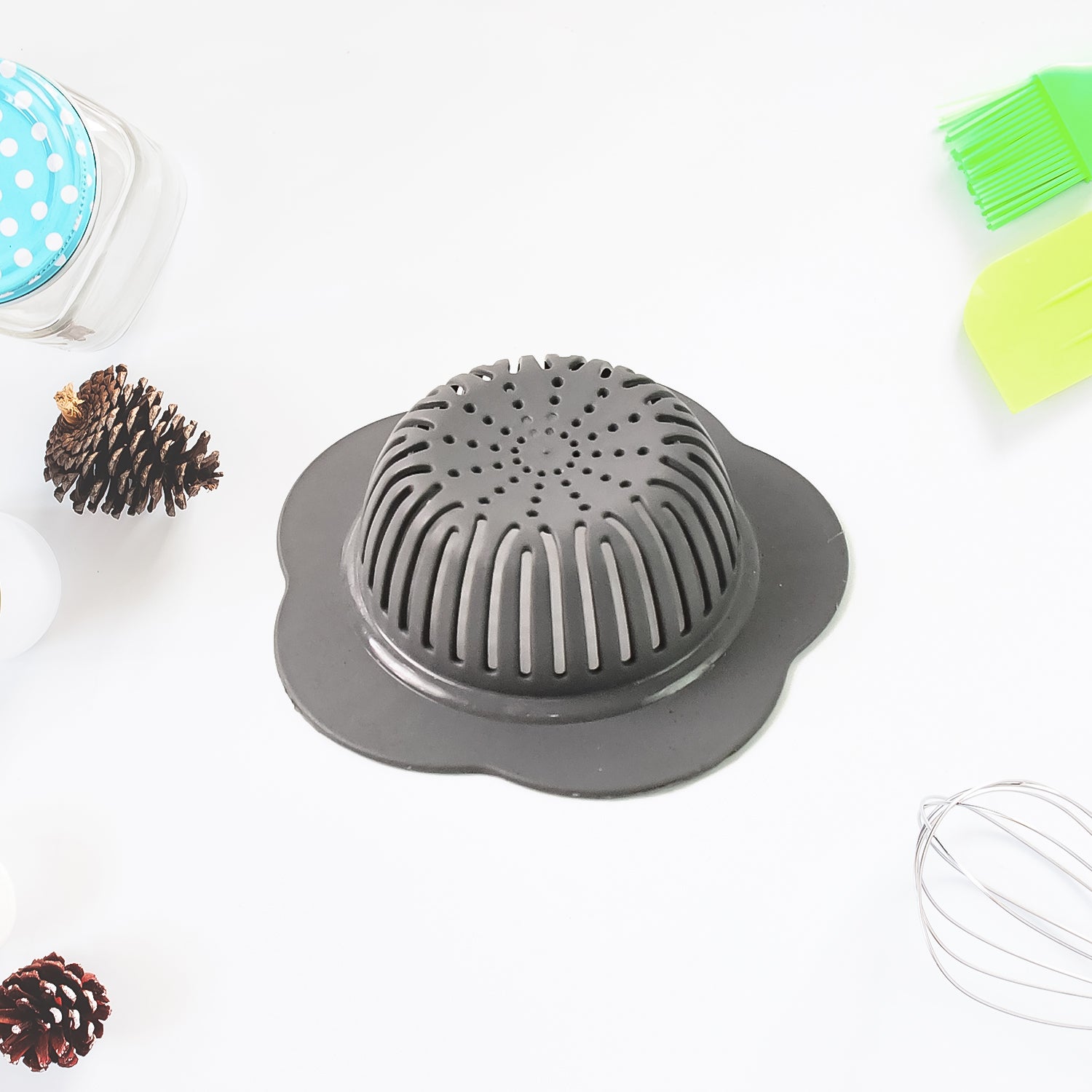 Plastic sink drain strainer with perforated base for efficient water flow