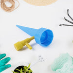Durable blue plant watering spike drip system for garden plants