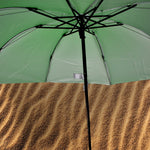 Ergonomic handle and sturdy frame of the windproof travel umbrella.