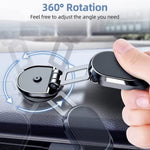 A driver's perspective of the magnetic car mount holding a phone for navigation.