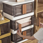 Space-saving plastic folding closet storage unit with moveable wheels