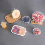 Flexible silicone covers fitted on various kitchen containers