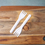 Close-up of single compostable bagasse fork highlighting sturdy design