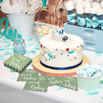 Mint green disposable paper napkins with decorative scalloped edges for baby shower