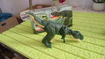 Close-up of the dinosaur toy's textured skin and detailed features.