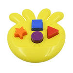 A child happily engaging with the Octo Shape Sorter Toy, learning through interactive play.