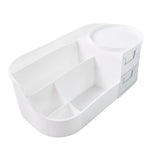 Makeup storage caddy featuring dual-layer drawers and rotating top tray