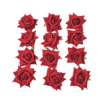 Individual red velvet rose hair clip with a sturdy pin, ready to adorn your hair.