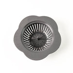 Flower-patterned plastic kitchen sink strainer for trapping debris