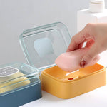 Close-up of the self-draining feature on a plastic soap dish.