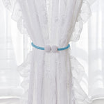 Set of two magnetic curtain tiebacks featuring pearl accents