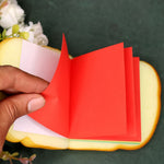 Realistic sandwich-shaped sticky note with brightly colored sheets for notes.
