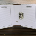 Multiple Lever Arch File Organizers stacked neatly on a shelf.