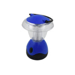 The Indo Glow Mini Camping Lantern emitting a powerful white LED light in a dark environment.
