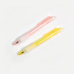 Detailed view of the CustoPen ballpoint pen's ergonomic grip and cap.