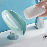 Angled view of the plastic self draining soap stand.
