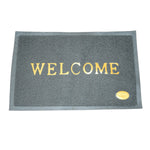 Detail view of the durable, anti-slip backing of the Welcome Door Mat, ensuring safety.