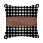 Elegant design of a faux leather and cotton pillow cover enhancing a bedroom.