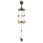 Vibrant outdoor wind bell chime hanging on porch hook