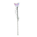 Child modeling the playful multi-color butterfly wings and a star wand.