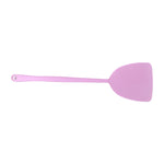 Household pest control tool visible with bright color