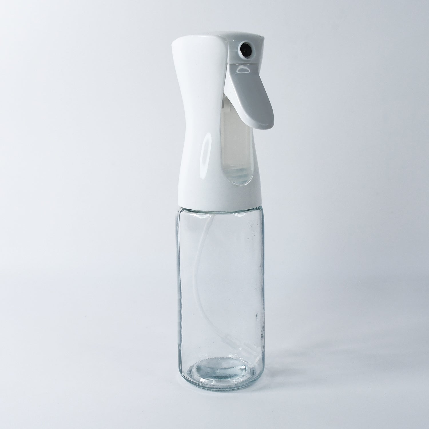 Versatile glass oil sprayer demonstrating its compact design.
