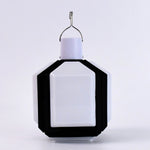 Portable camping LED light shown folded for easy travel and storage