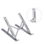 The metal portable laptop stand holds a laptop at an optimized height for comfortable viewing.