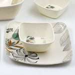 Packaging box of the 11-piece plastic dinner set, highlighting its gift-ready nature.