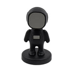 Side view of the stylish Cartoon Astronaut Car Mobile Holder on a dashboard.