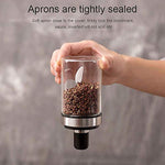 Ergonomic glass spice jar with a black lid, perfect for masalas and seasonings.