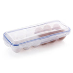 Egg storage tray with its lock clips open, ready for filling.