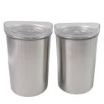 Close-up of the transparent lid and brushed finish of a Konvex steel container, highlighting quality.