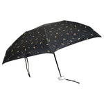 Top-down view of the closed compact umbrella with its zip case.