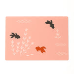 Set of four stylish dining placemats with fish patterned design
