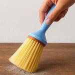 Compact cleaning brush with short plastic handle for tough scrubbing