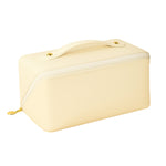 Beige toiletry and makeup pouch with zipper ideal for travel storage
