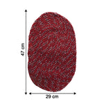 Close-up of red floor mat showing textured fabric