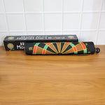 Closed roll-up dartboard in travel tube with included safety darts